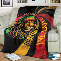 Black Rastafarian lion blanket with multicolor mane, red sunburst, and yellow accents