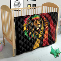 Black quilted crib blanket with colorful lion portrait and rainbow headwrap design.