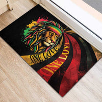 Square rubber doormat showing lion head with rastafarian colors and One Love text