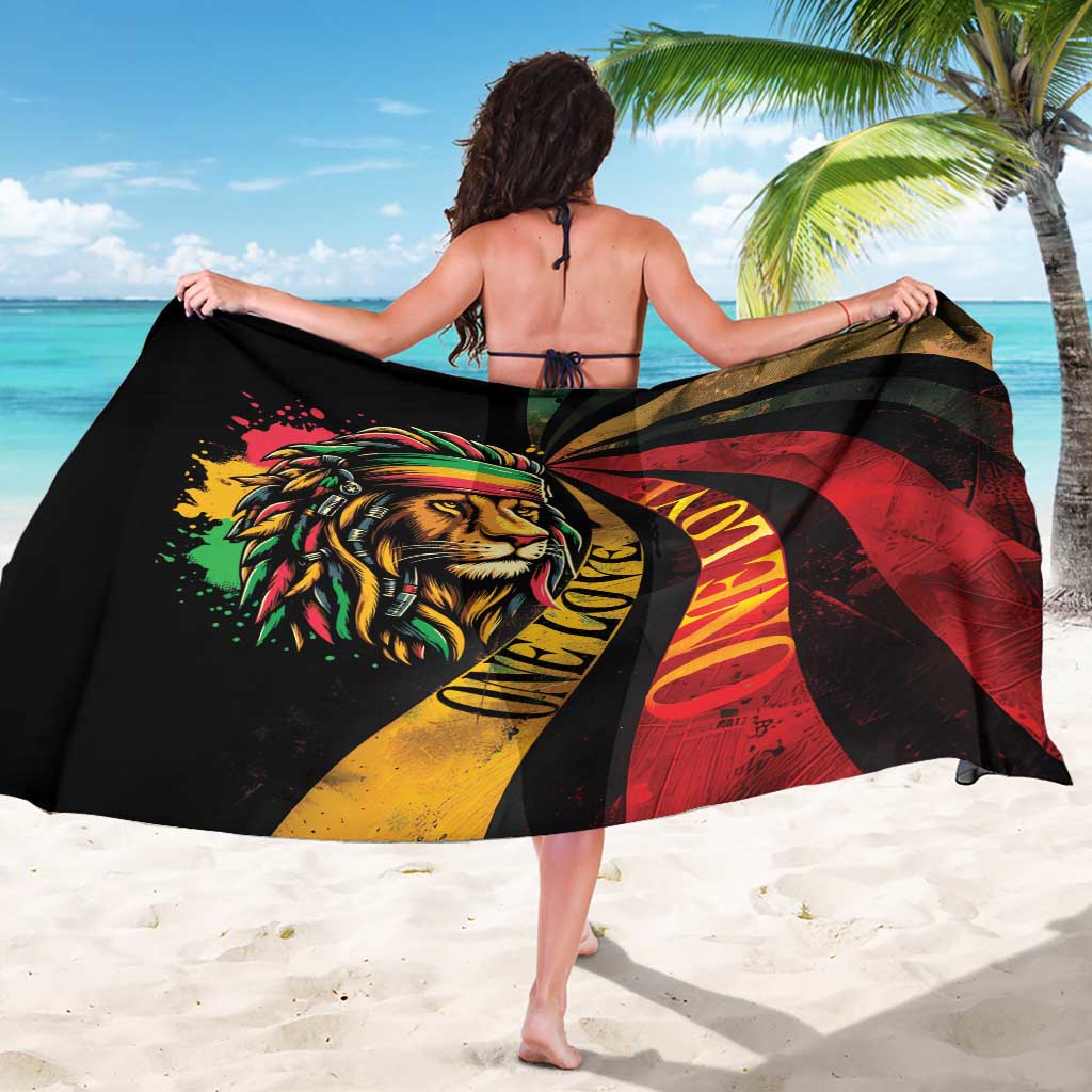 Black lion One Love sarong, red yellow swirl design, draped wrap on model