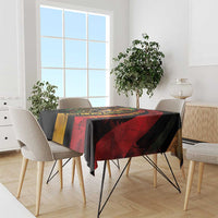 Rectangular tablecloth with lion graphic, red and yellow panels, and black border