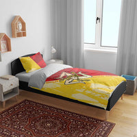 La Bandiera Sicilia bedding set on a bed with yellow-and-red duvet and two matching pillows