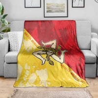 Sicilian flag throw blanket, red and yellow, with angel emblem on sofa