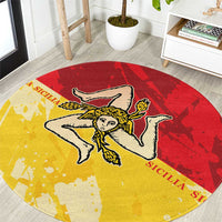 Round carpet with red and yellow Sicilian flag design, central angel emblem