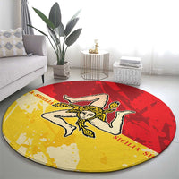 Round carpet with red and yellow Sicilian flag design, angel figure in the center
