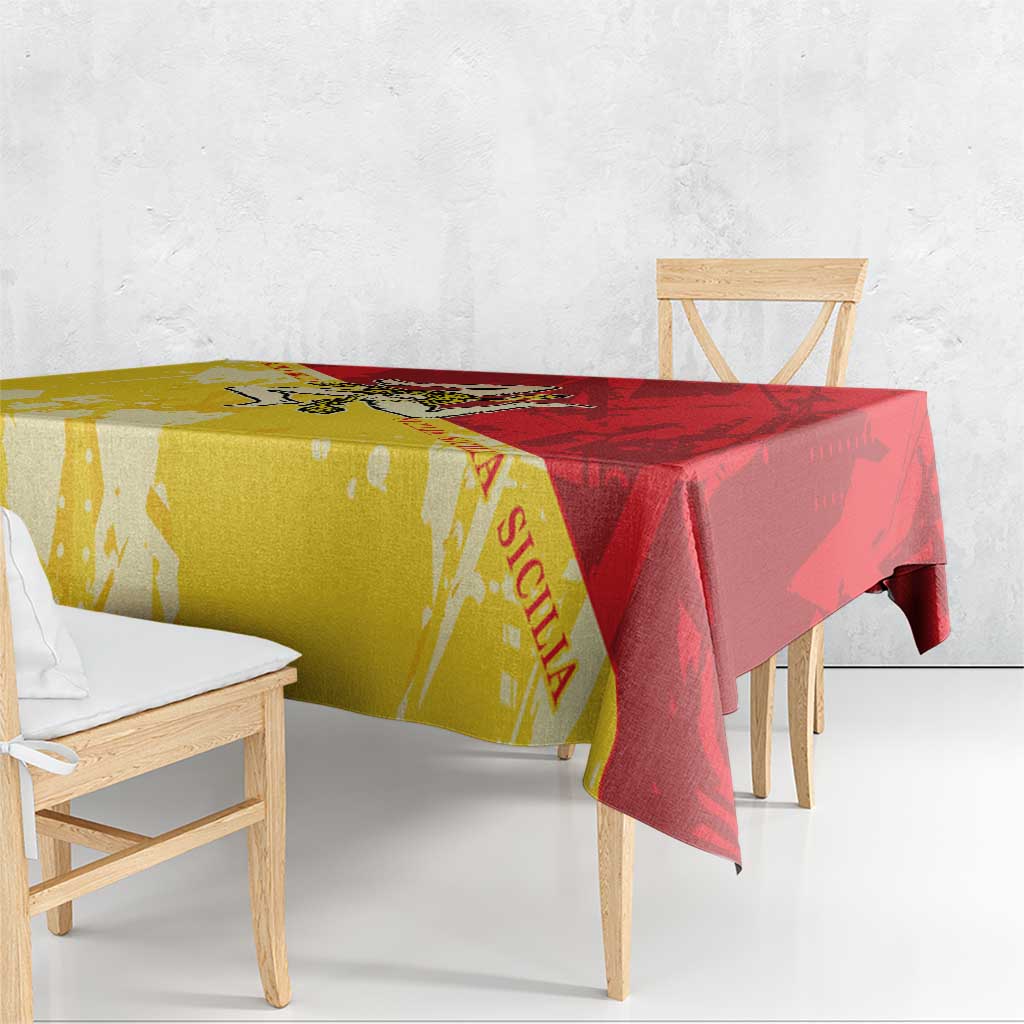 Sicily region tablecloth in gold and red, hanging over a wooden bench