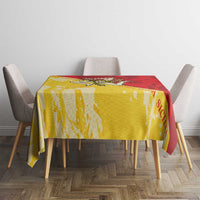 Sicily region tablecloth in gold and red over square dining table
