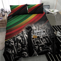 Black duvet and 2 pillowcases with crowd portrait, green-red stripe across the top