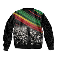 Black bomber jacket with ribbed collar and cuffs, back graphic of crowd and stripe print