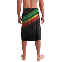 Black lavalava skirt with green, red, and yellow Pan-African stripe band