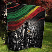 Black quilt with Pan-African diagonal stripe, 'MAKE HISTORY Her' text and black-and-gray portrait