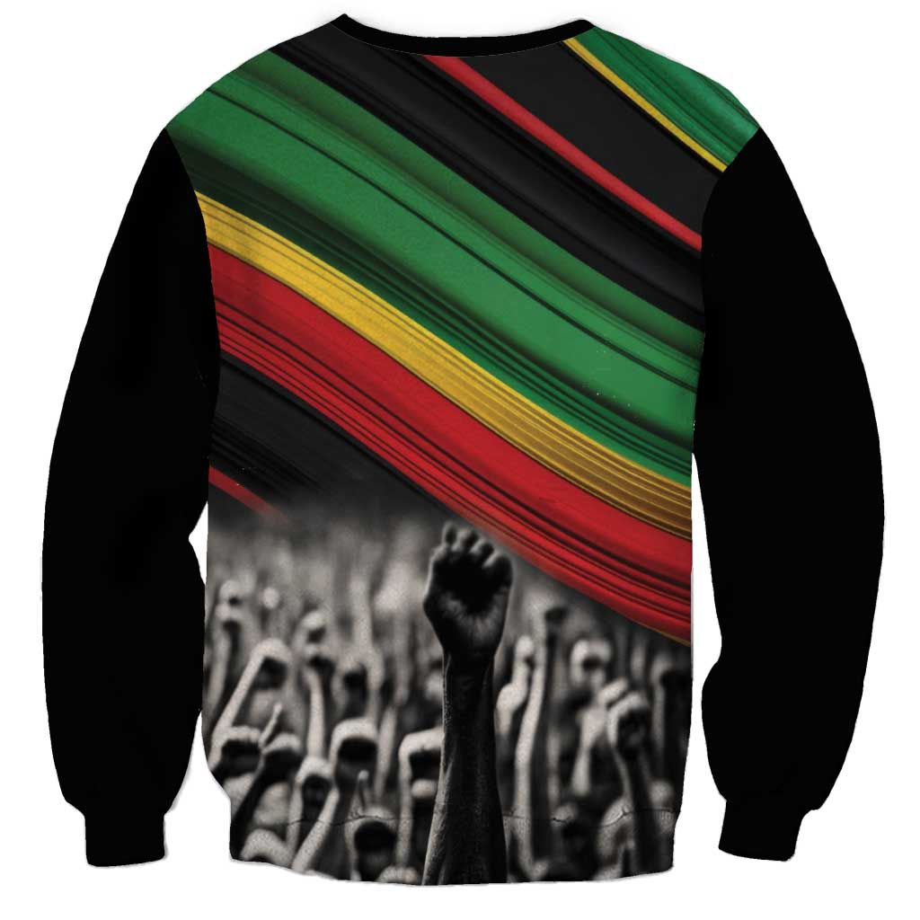Unisex black sweatshirt with green, red, and gold stripe graphic and black-and-white crowd