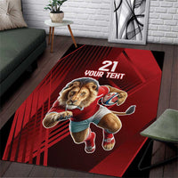 Red sports area rug with lion mascot, “21” and “YOUR TEHT” graphic