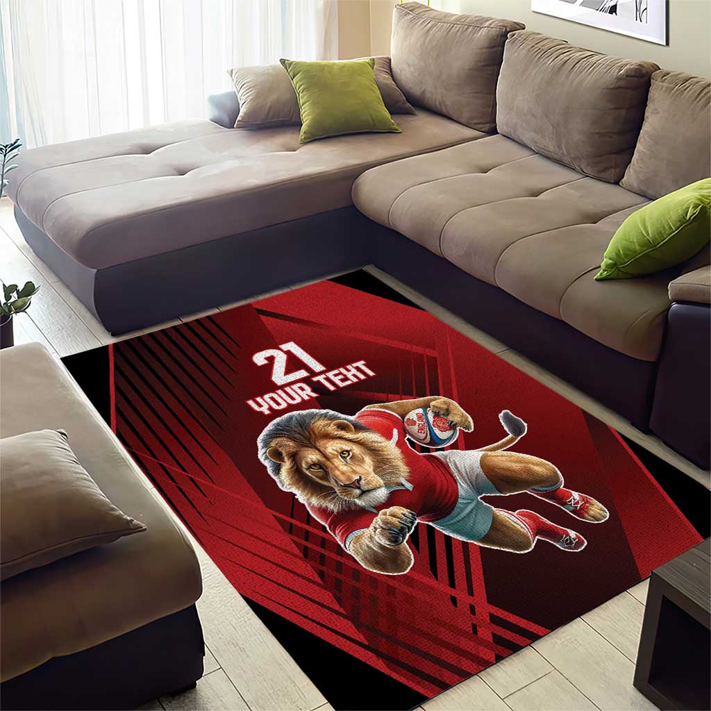 Red lion mascot area rug with “21” and “YOUR TEHT” on central graphic