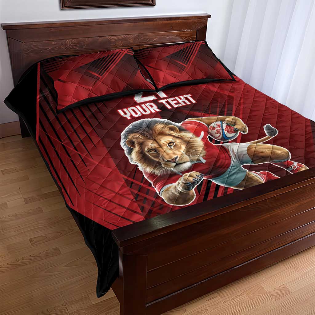 Red quilt bed set with lion mascot graphic on quilt and pillow, red check pattern