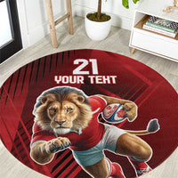 Red round sports rug with lion mascot in red jersey and “21 YOUR TERT” text