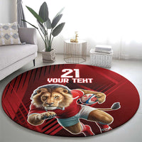 Red round rug featuring a lion mascot with a rugby ball and “21 YOUR TERT”