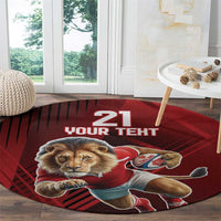Red round lion mascot rug with rugby ball graphic and “21 YOUR TERT” text