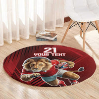 Red circular sports rug with lion mascot holding a rugby ball and “21 YOUR TERT”