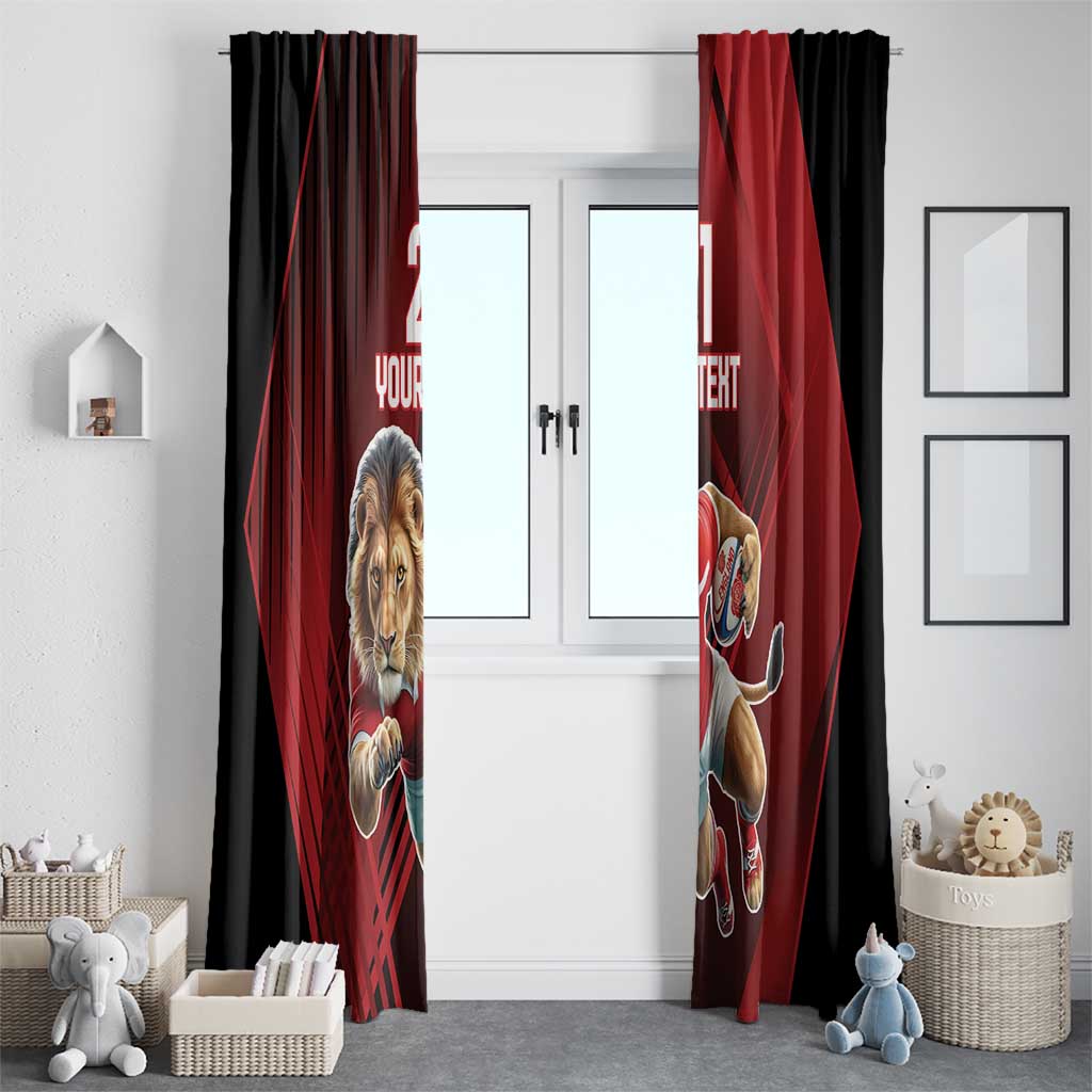 Two-tone red and black curtains with lion mascot graphic across window