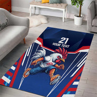 Blue area rug featuring rooster running and red/white stripe border