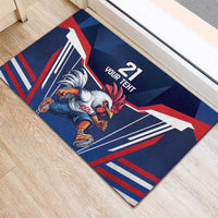 Blue rubber doormat on hardwood with rooster running illustration and “21 YOUR TEXT”