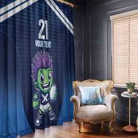 Blue curtain panel with diagonal white stripes and green mascot character with number and text