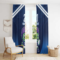 Blue window curtains with diagonal white stripes and green mascot face and body graphics