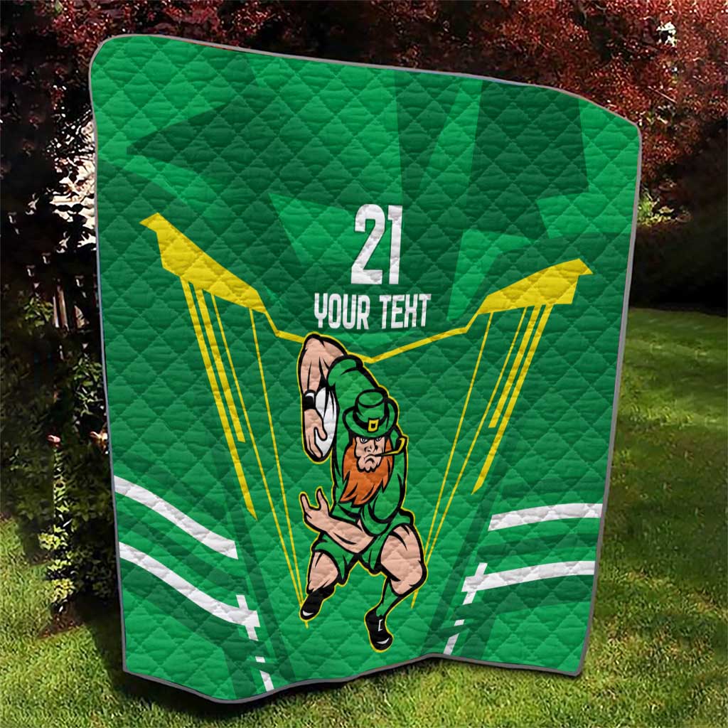 Green quilt blanket on grass with Irish warrior mascot, “21 YOUR TEXT,” yellow rays and stripes.