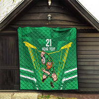 Green quilt blanket with Irish warrior mascot, “21 YOUR TEXT,” and yellow rays design.