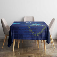 Navy blue tablecloth on dining table with center sports emblem and custom text