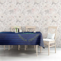 Navy blue sports tablecloth on dining set with printed emblem and border