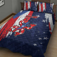 Blue quilt bed set with red stripe panel and star accents; large frog emblem on quilt.