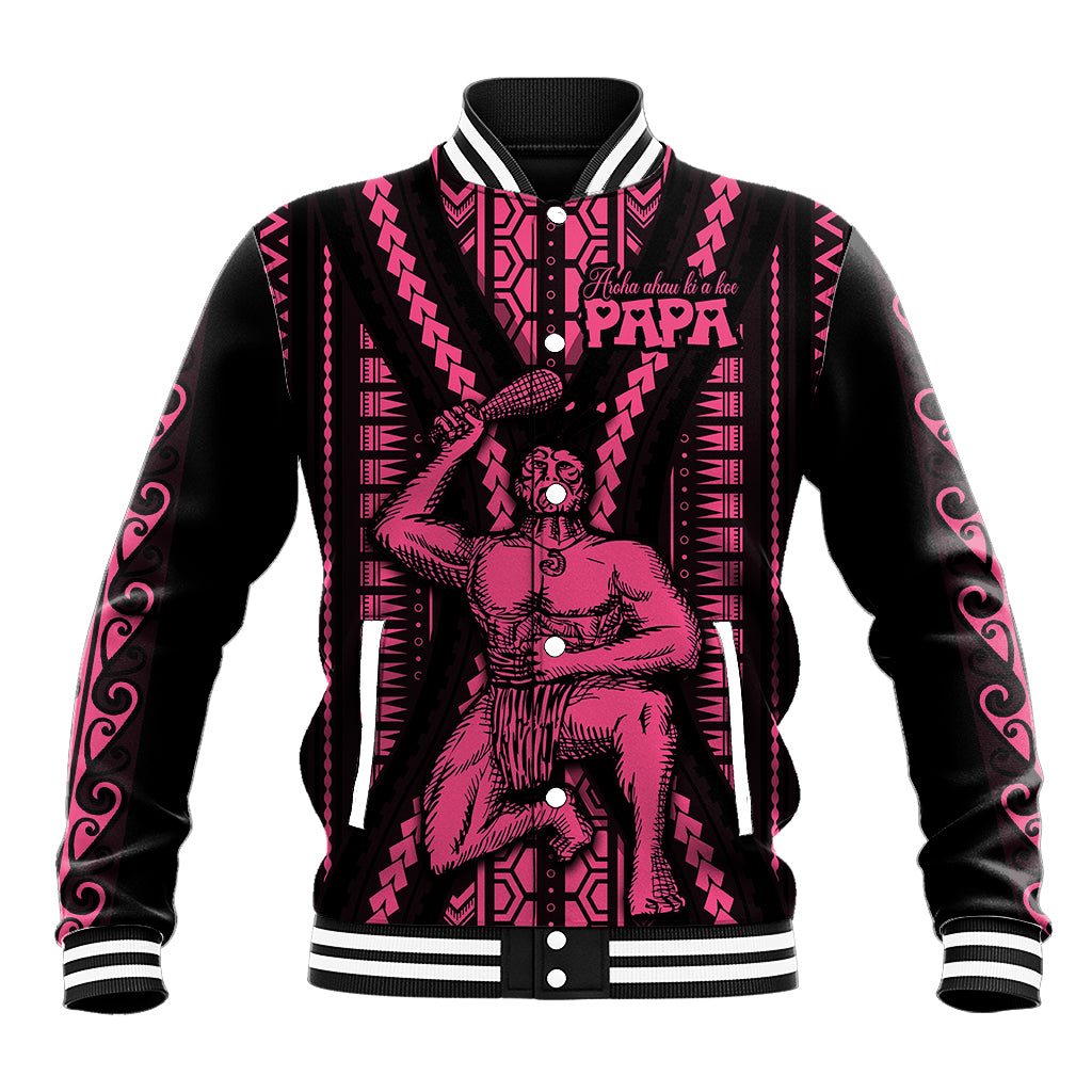 Unisex black baseball jacket with pink Maori-style graphic and snap-front, striped ribbed cuffs