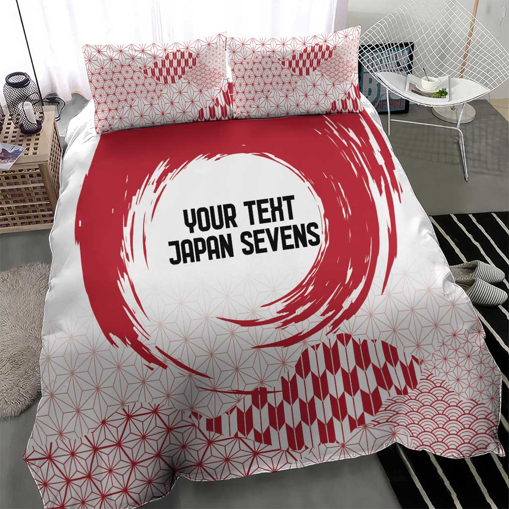 Red and white duvet cover with bold circle emblem, geometric lines, and wave pattern
