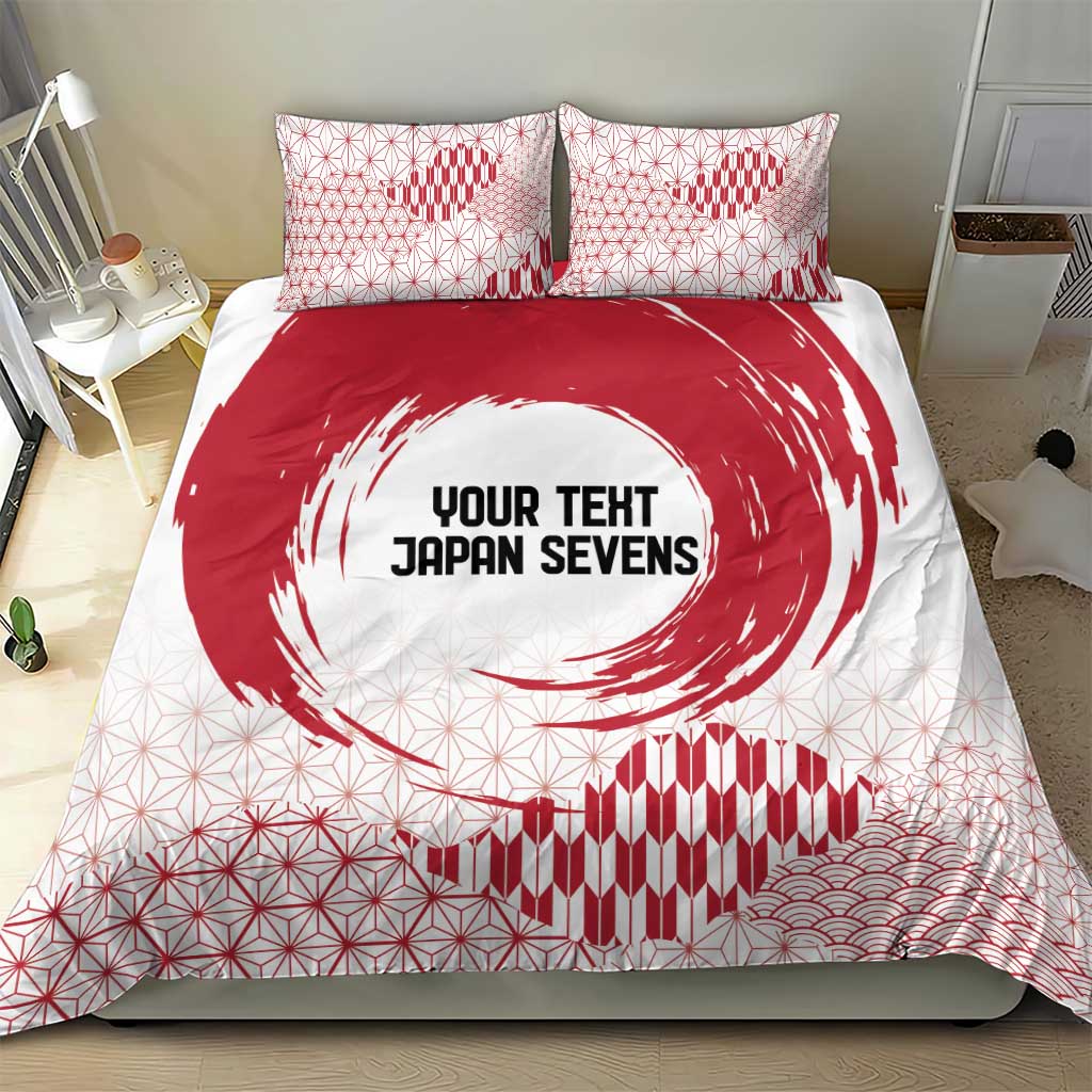 Red and white bedding set featuring duvet cover with circle emblem and grid-and-wave design