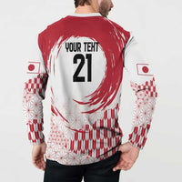 Red and white button sweatshirt with back number 21 graphic and flag sleeve prints, worn