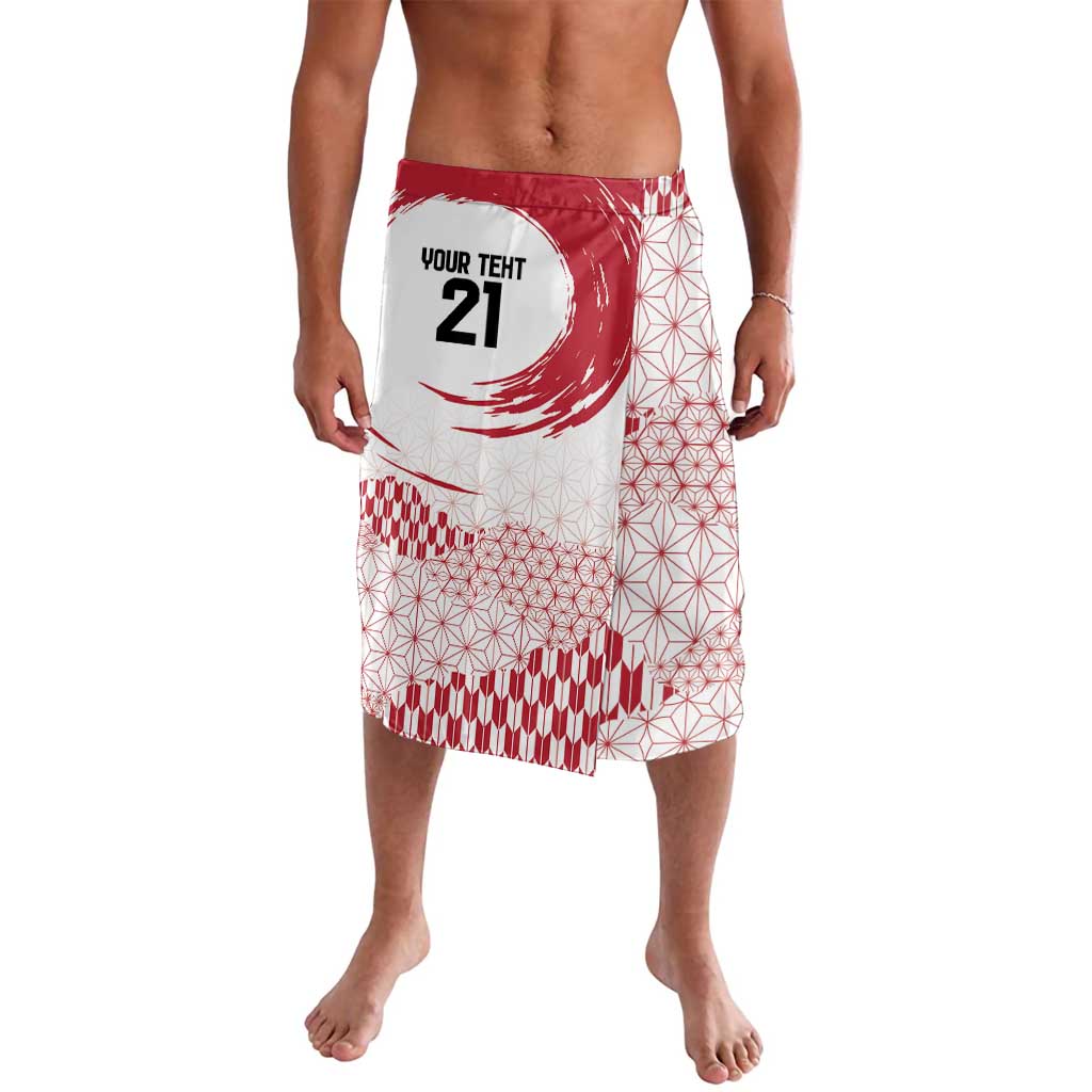 White and red patterned lavalava sarong with red sun and geometric motifs