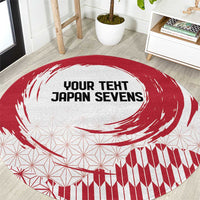 Round red and white Japanese sevens carpet with custom center text and wave pattern