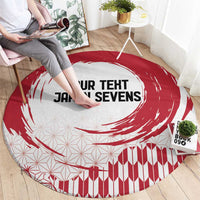 Round red and white carpet, bold central text ring and geometric stripe border