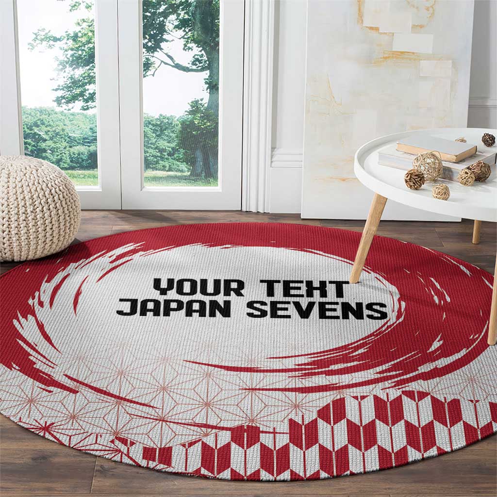 Round red and white carpet featuring YOUR TEXT JAPAN SEVENS and fan-and-wave motif