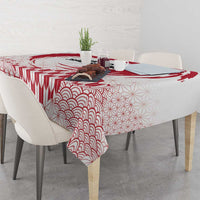 Red and white tablecloth with wave and geometric fan pattern, corner drape detail