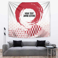 White tapestry with red rising sun brush circle, striped facade, and repeating geometric grid