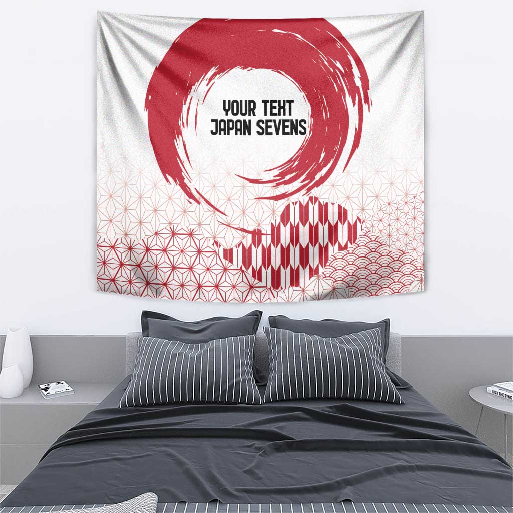 White hanging tapestry with red rising sun brush circle over striped facade and waves