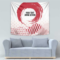 White tapestry with red rising sun brush circle and wave pattern in the lower right