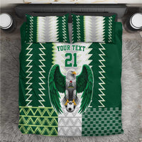 Green bedding set with bold zigzag pattern and eagle crest, “YOUR TEXT” and number 21
