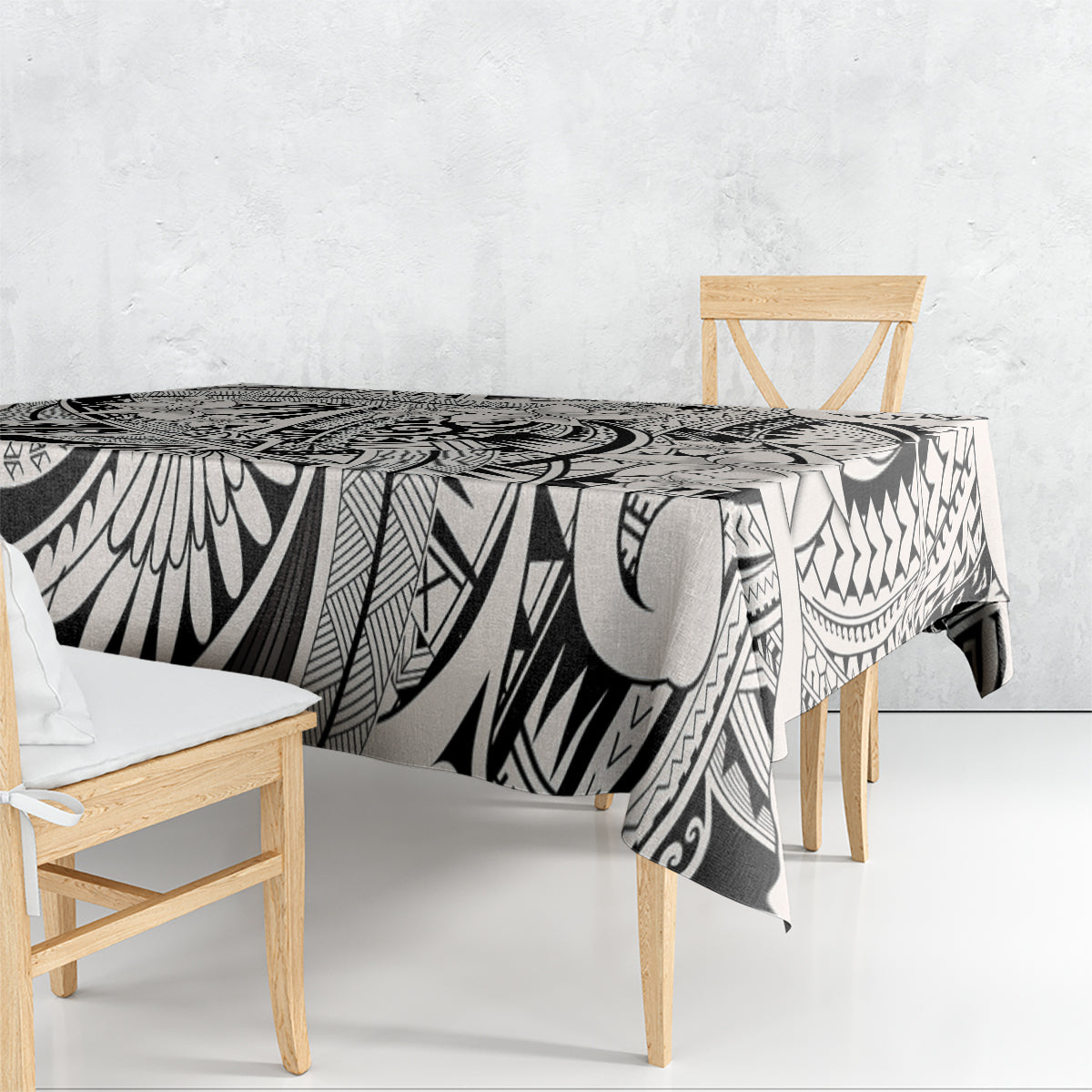 Black-and-white tribal tablecloth with bold leaf and geometric print