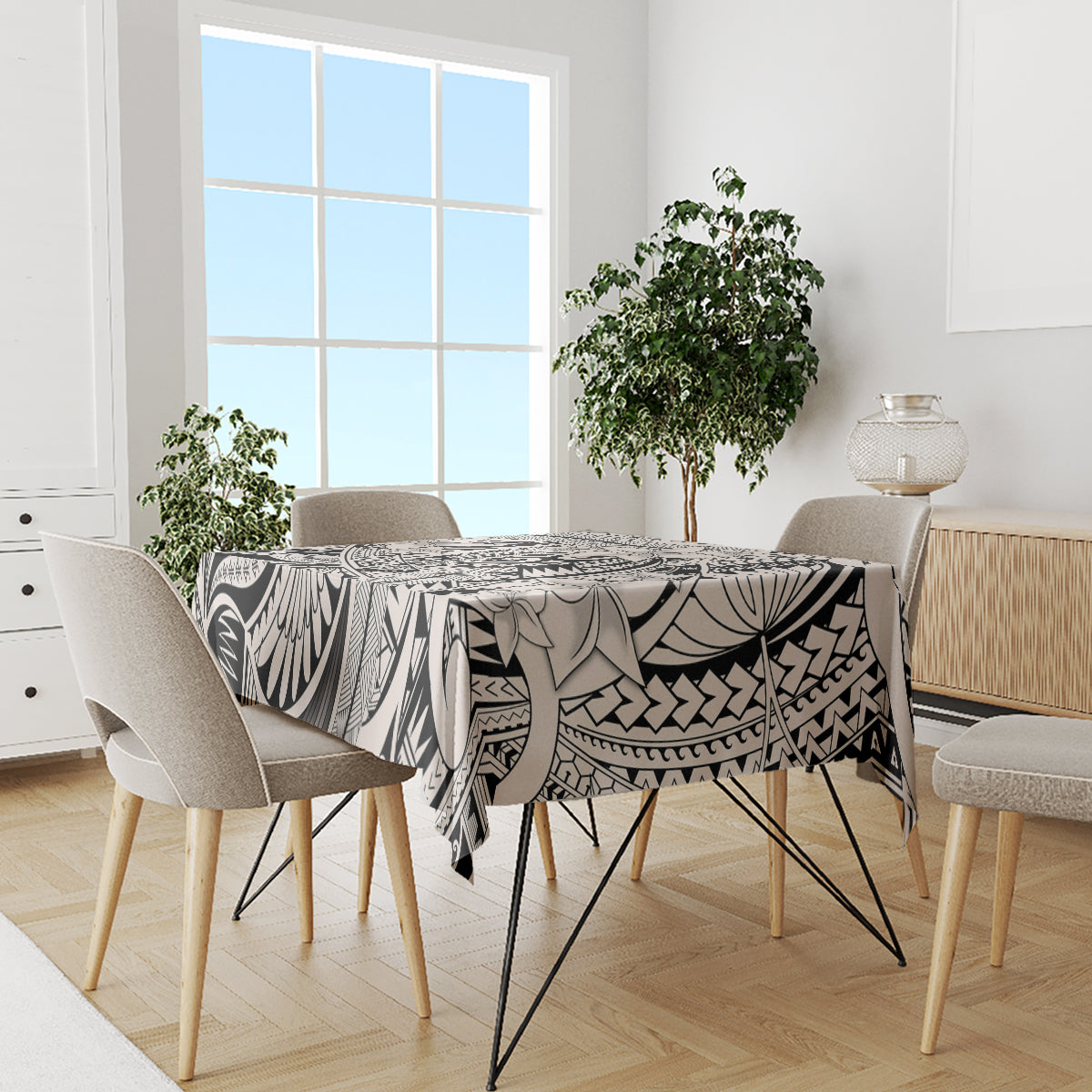 Black-and-white tribal tablecloth with ornate floral and fan-shaped patterns