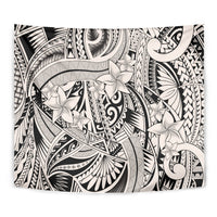 Close-up tribal Polynesian spirit tapestry in beige and black with floral ornament patterns
