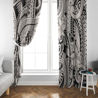Pair of tribal window curtains in black and light gray, patterned with flowers and swirls